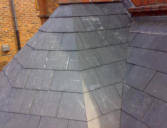 close mitered hip on slate roof in chester