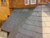 close mitered hip  on slate roof in chester